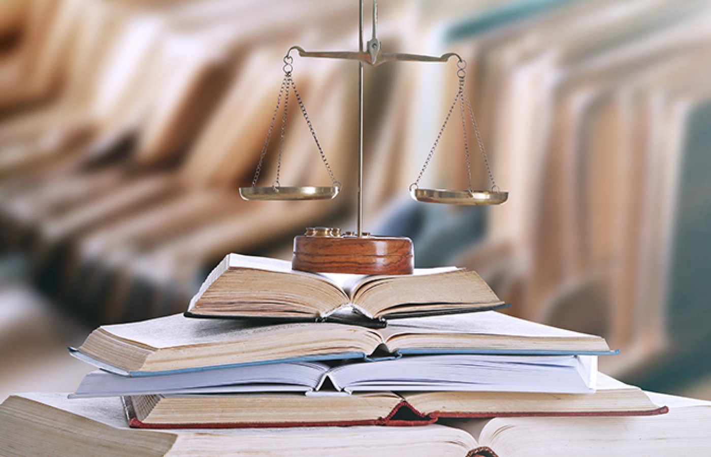 scale on top of open books 