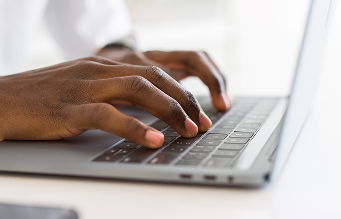 hands on computer keyboard