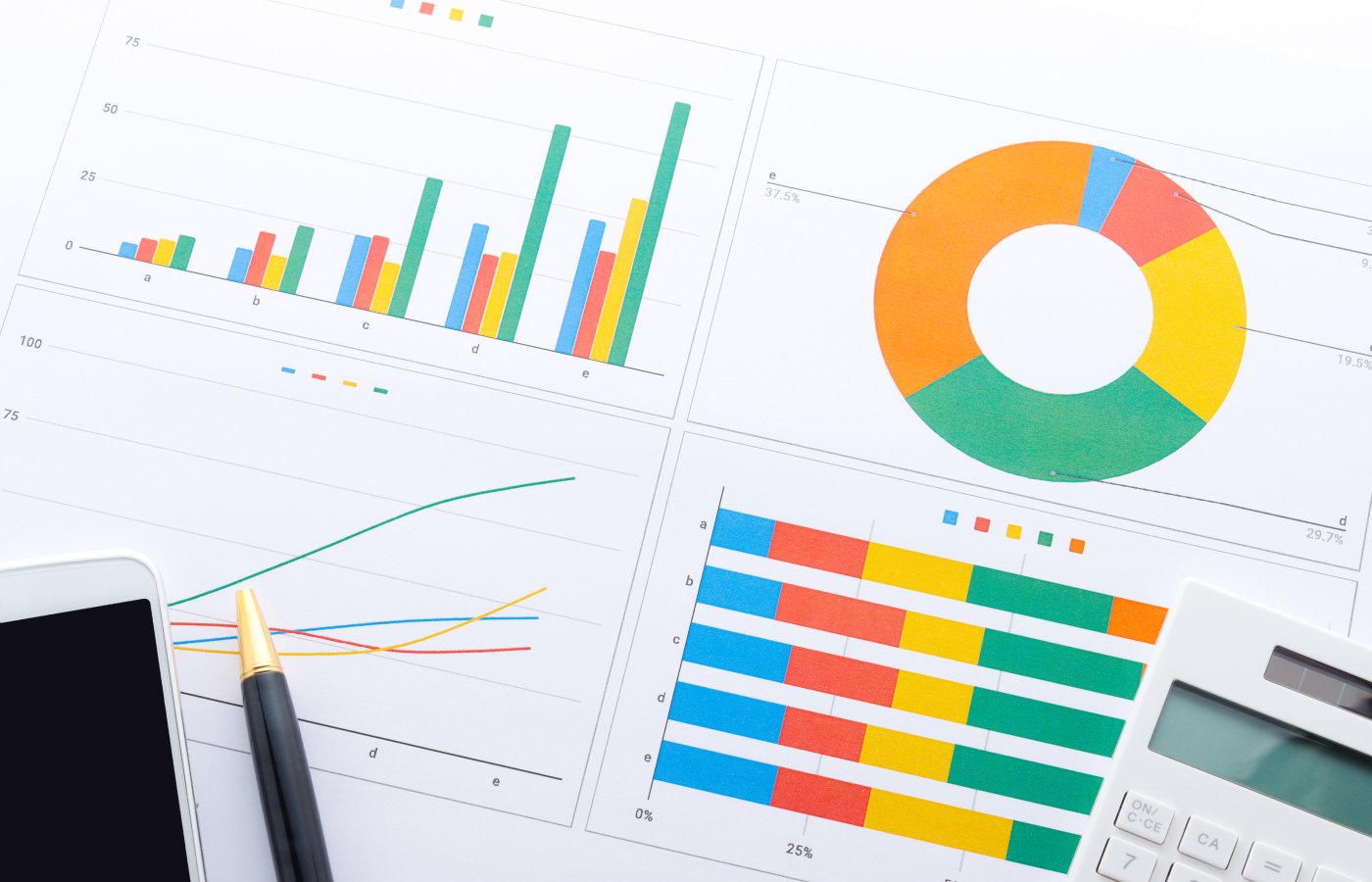 papers with charts and graphs on them