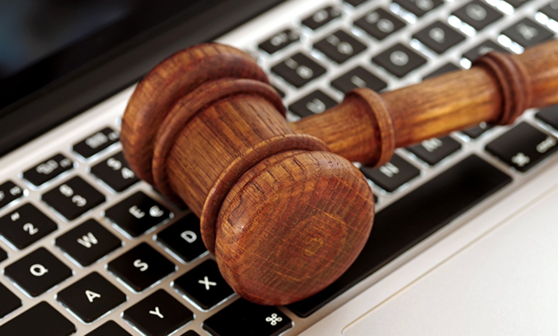 Gavel on computer keyboard