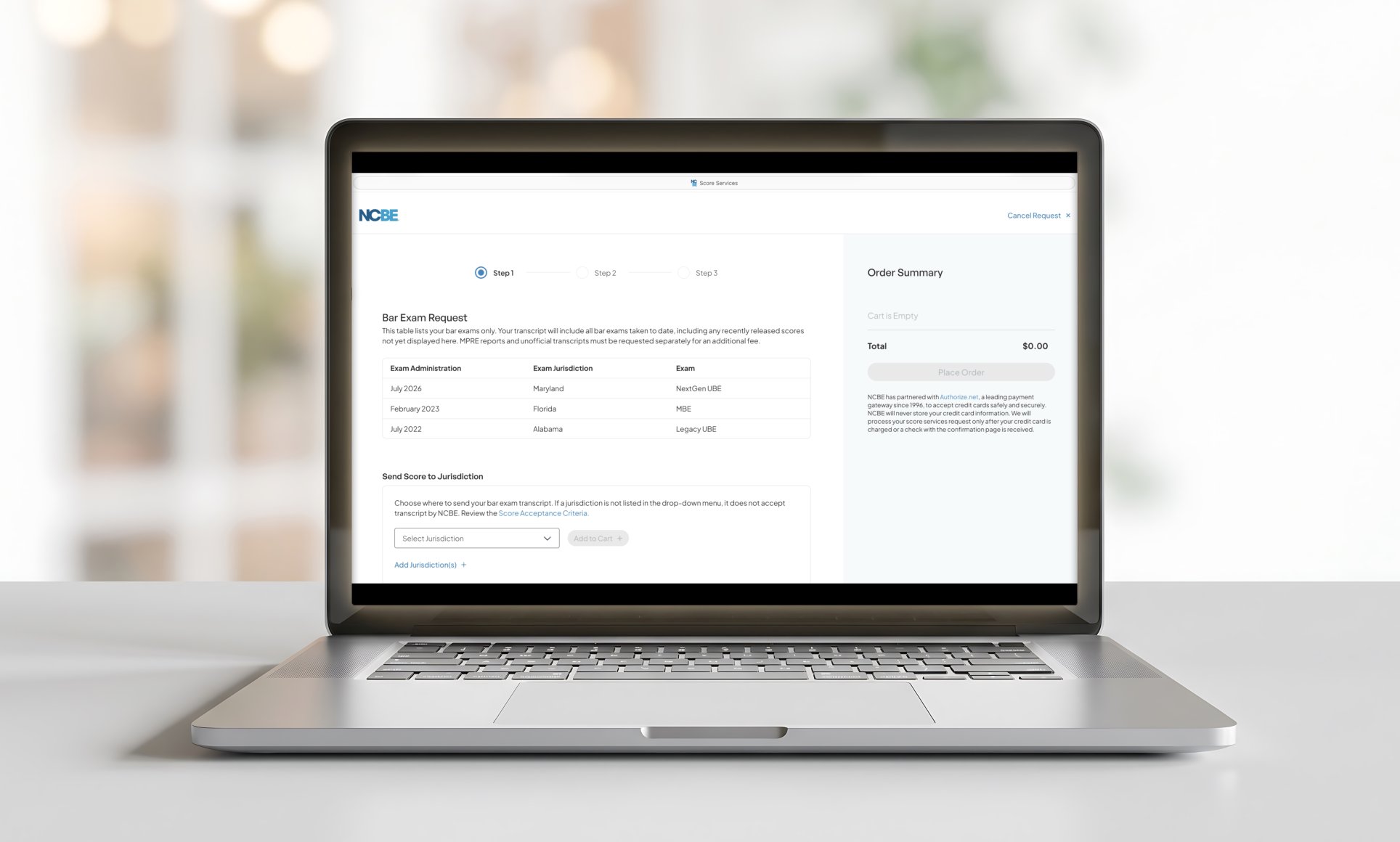 laptop on a desk with an image of score services screen from the NCBE candidate portal. Wording on screenshot is not readable. 