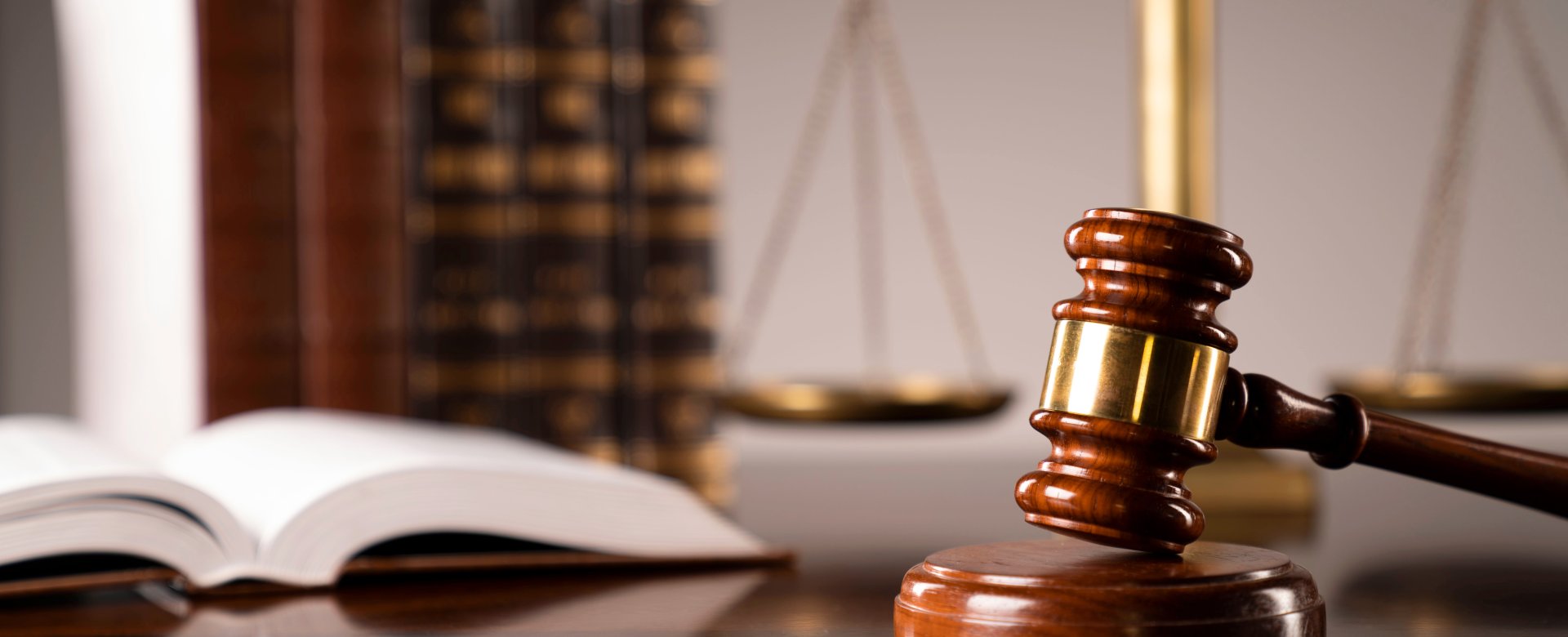 Law books, gavel and scale