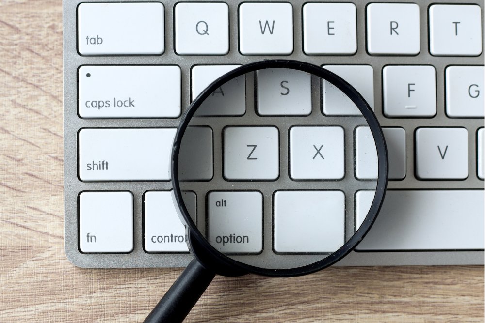 magnifying glass on keyboard
